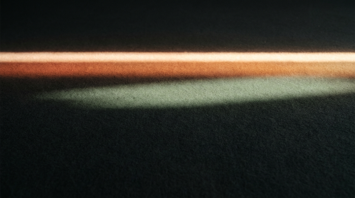 Single bold luminous horizontal line breaking through dark charcoal field — visual metaphor for the initiating, breakthrough energy of a Manifestor